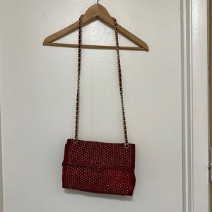 Gold studded red bag